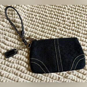 Coach Black Wristlet with White Stitching